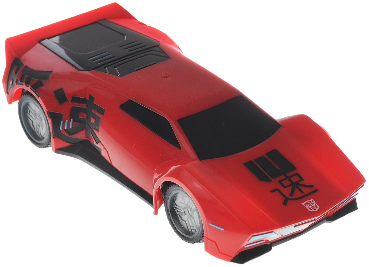 Dickie Toys Машина на радиоуправлении Sideswipe3114001 Dickie Toys Машина на радиоуправлении Sideswipe3114001Машина на радиоуправлении Dickie Toys Sideswipe с неоновой подсветкой непременно понравится любому поклоннику трансформеров. Sideswipe - это автобот, один из главных героев мультфильма Трансформеры. Игрушка полностью повторяет свой экранный прототип, выполнена в масштабе 1:24. Машина изготовлена из безопасного и прочного пластика с элементами из металла. С помощью пульта управления машина может двигаться вперед-назад, влево-вправо, останавливаться, имеется функция Турбо. Особую реалистичность игре с машиной придает неоновая подсветка дисков. Игрушка станет главным действующим лицом увлекательной игры по сюжету мультфильма или ребенок сможет придумать новую историю, проявив свою фантазию. Пульт управления работает на частоте 2,4 GHz. Для работа машины рекомендуется купить 3 батарейки напряжением 1,5V типа АА (не входят в комплект). Для работы пульта управления рекомендуется купить 3 батарейки напряжением 1,5V типа AAA (не входят в комплект).