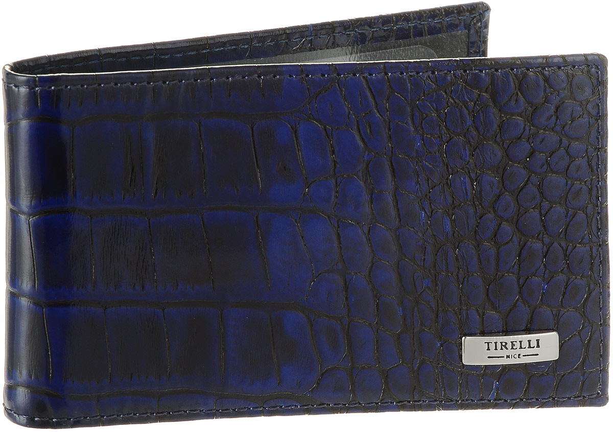 Футляр для карточек Tirelli Кроко, цвет: синий. 15-325-1515-325-15 Футляр для карточек Tirelli Кроко, цвет: синий. 15-325-1515-325-15Футляр для карточек Tirelli Кроко изготовлен из натуральной кожи синего цвета с декоративным теснением под рептилию. Футляр оформлен фирменным логотипом. Внутри имеется 12 кармашков из прозрачного пластика для хранения пластиковых карт, визиток, дисконтных карт и т. п. Такой футляр не только поможет сохранить внешний вид ваших документов и защитит их от повреждений, но и станет ярким аксессуаром, который подчеркнет ваш образ. Изделие упаковано в подарочную коробку синего цвета с логотипом фирмы Tirelli. Характеристики: Материал: натуральная кожа, текстиль, пластик. Цвет: синий. Размер футляра (в сложенном виде): 11 см х 6,5 см.