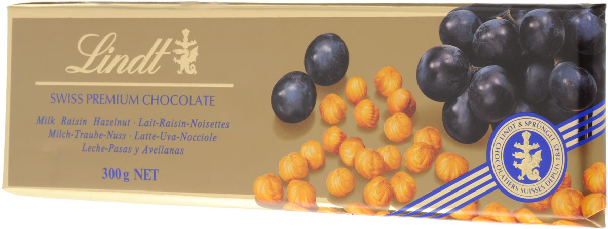 Lindt Gold молочный шоколад с изюмом и цельным фундуком, 300 г7610400013802 Lindt Gold молочный шоколад с изюмом и цельным фундуком, 300 г7610400013802Шоколадная плитка большого формата Swiss Premium из молочного шоколада с цельным фундуком и изюмом создана по традиционному швейцарскому рецепту Мэтрами Шоколатье Lindt с 1845 года. Уважаемые клиенты! Обращаем ваше внимание, что полный перечень состава продукта представлен на дополнительном изображении.
