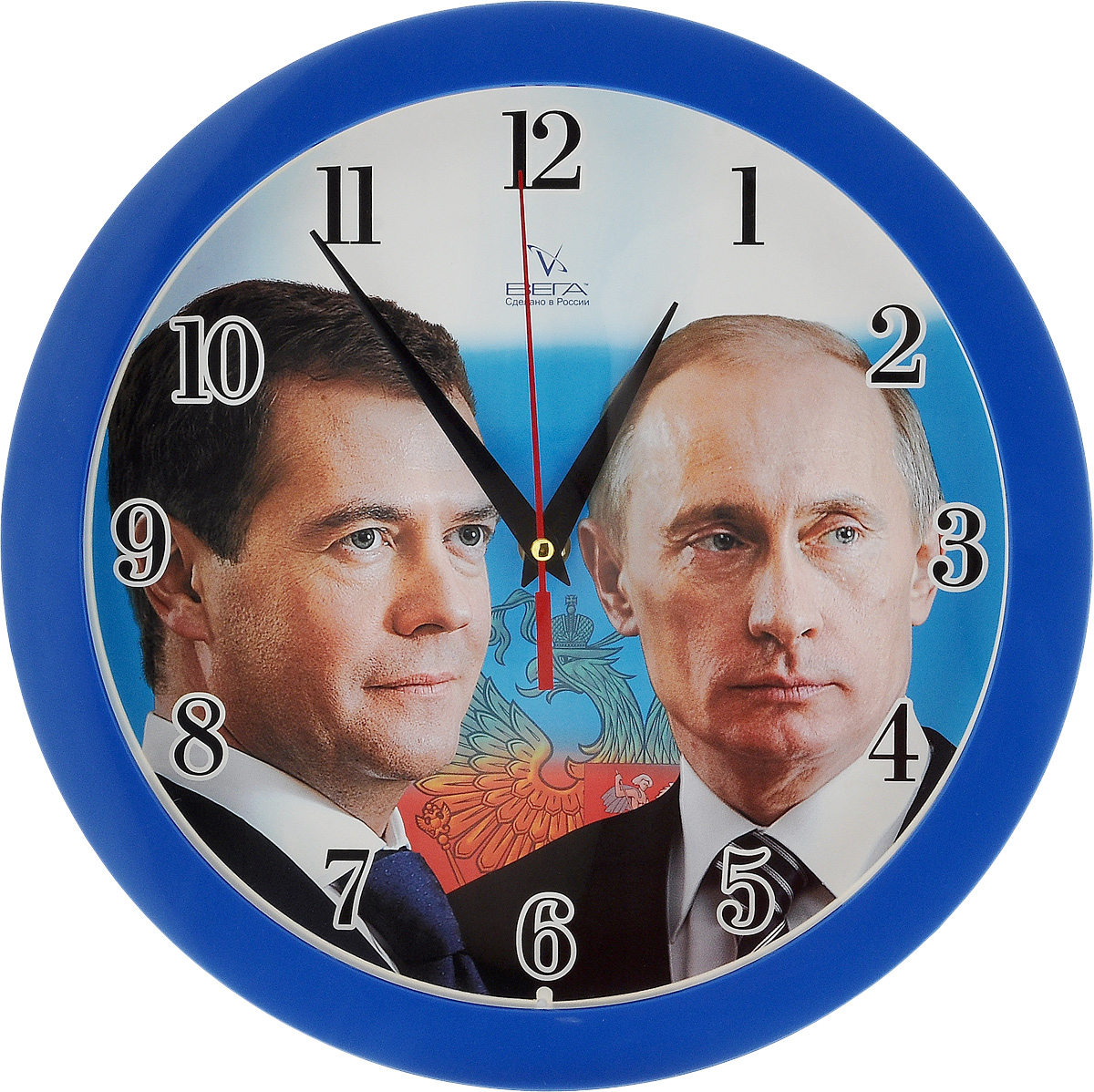 Часы настенные Вега Первые лица, диаметр 28,5 смП1-10/7-40 Часы настенные Вега Первые лица, диаметр 28,5 смП1-10/7-40Настенные кварцевые часы Вега Первые лица, изготовленные из пластика, прекрасно впишутся в интерьер вашего дома. Круглые часы имеют три стрелки: часовую, минутную и секундную, циферблат защищен прозрачным стеклом. Часы работают от 1 батарейки типа АА напряжением 1,5 В (не входит в комплект). Диаметр часов: 28,5 см.