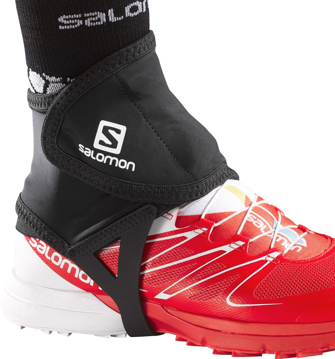 Гетры спортивные Salomon Trail Gaiters Low, цвет: черный. Размер ML32916600 Гетры спортивные Salomon Trail Gaiters Low, цвет: черный. Размер ML32916600Гетры Salomon Trail Gaiters Low выполнены из высококачественного полиэстера. Изделие дополнено липучками. Гетры удобно надеваются поверх обуви и защищают ногу от ударов камней и веток.