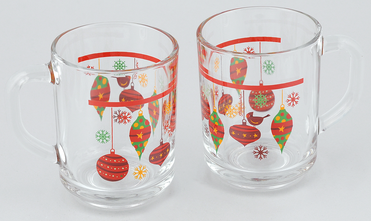 Набор кружек Pasabahce Workshop Christmas Toys, 250 мл, 2 шт55029B/D11 Набор кружек Pasabahce Workshop Christmas Toys, 250 мл, 2 шт55029B/D11Набор Pasabahce Workshop Christmas Toys состоит из двух кружек с удобными ручками, выполненных из прочного натрий-кальций-силикатного стекла. Кружки декорированы ярким изображением. Изделия хорошо удерживают тепло, не нагреваются. На них не выгорает и не вымывается рисунок. Посуда Pasabahce Workshop будет радовать вас яркими, интересными рисунками и качеством изготовления. Объем кружки: 250 мл.