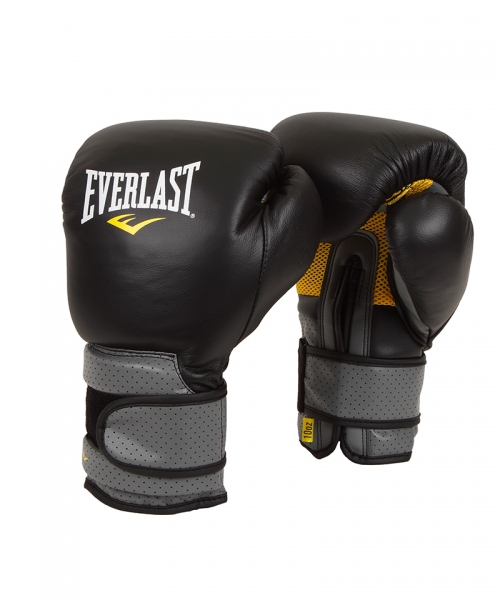 Боксерские перчатки Everlast Pro Leather Strap, цвет: черный. Вес 16 унций691601 Боксерские перчатки Everlast Pro Leather Strap, цвет: черный. Вес 16 унций691601Everlast C3 Pro Hook & Loop Training Gloves - тренировочные боксерские перчатки, разработанные и изготовленные с применением новейших технологий. Уникальный пенный наполнитель C3 Foam™ превосходно амортизирует даже самые мощные удары, гарантируя безопасность во время тренировок. Материал-сетка на ладони вкупе с технологией EverCool™ обеспечивают отличную вентиляцию и позволяют руке дышать. В то же время, технология EverDri™ активно борется с потом, уничтожая излишки влаги и плохой запах. Перчатки изготовлены из высококачественной натуральной кожи, что дает им солидный запас прочности и отличную износостойкость, а застежка-липучка позволяет подогнать их точно по руке, плотно зафиксировав запястье. Тренировочные боксерские перчатки C3 Pro Hook & Loop Training Gloves предназначены для спаррингов, работы с тяжелыми мешками и лапами.