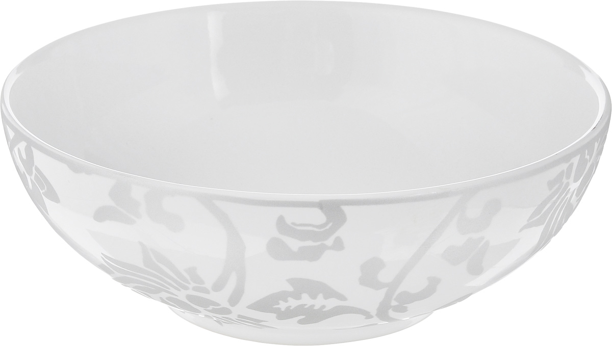 Салатник Sango Ceramics Джапан Деним Сильвер, диаметр 16,5 смUTJDS17640 Салатник Sango Ceramics Джапан Деним Сильвер, диаметр 16,5 смUTJDS17640Салатник Sango Ceramics Джапан Деним Сильвер выполнен из высококачественной керамики и декорирован оригинальным рисунком. Изделие отлично подходит для сервировки салатов, закусок, овощей и фруктов. Такой салатник отлично подойдет для повседневного использования. Он прекрасно впишется в интерьер вашей кухни. Можно использовать в микроволновой печи и мыть в посудомоечной машине. Диаметр (по верхнему краю): 16,5 см. Высота стенки: 5,5 см.
