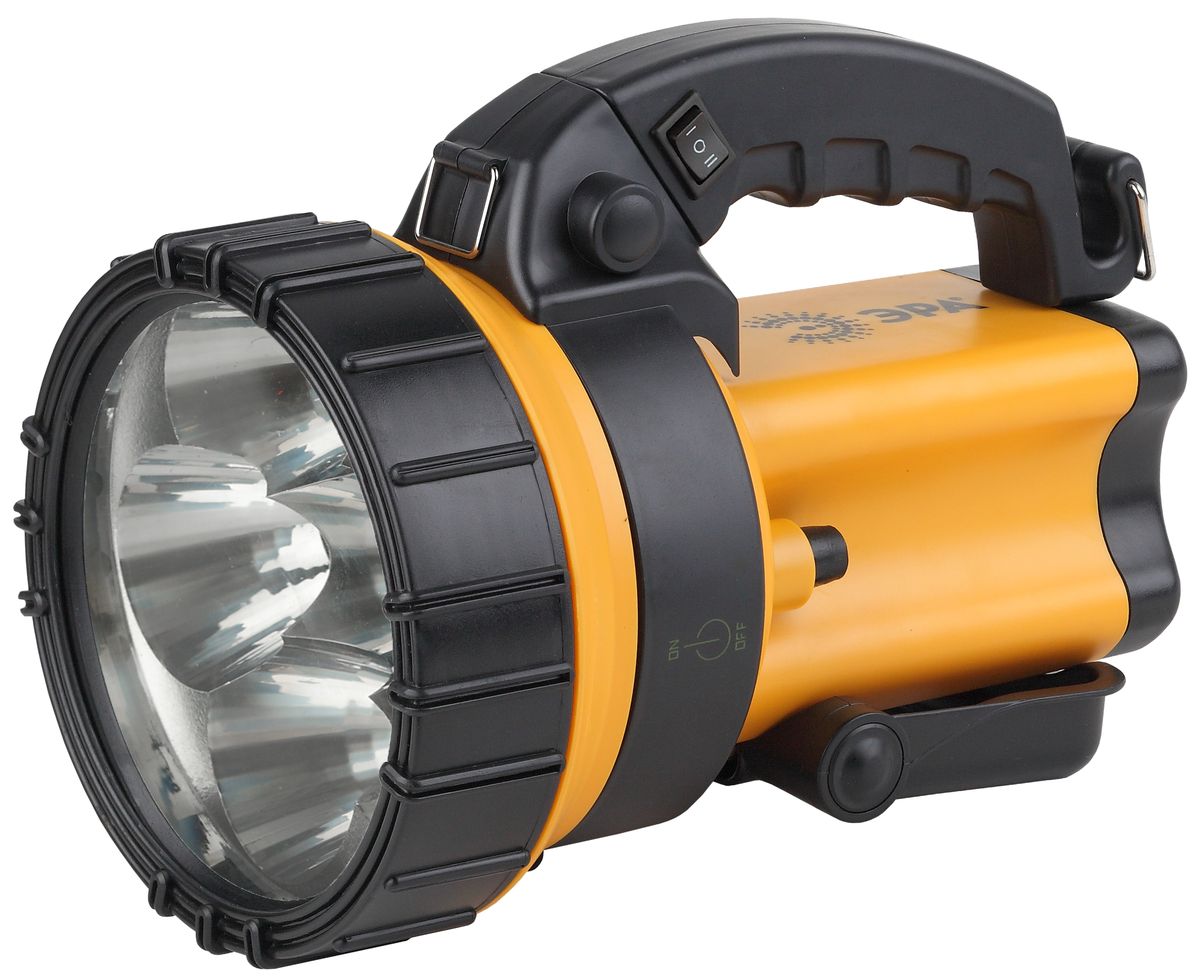 Фонарь ручной ЭРА, 6x1Вт LED SMD, аккумулятор 4В4.5Ач, ЗУ 220V+12VFA6W Фонарь ручной ЭРА, 6x1Вт LED SMD, аккумулятор 4В4.5Ач, ЗУ 220V+12VFA6WАккумуляторный светодиодный прожектор: 6x1Вт белые светодиоды (два режима работы 50% и 100% яркости) сигнальный красный светильник в задней части фонаря Аккумулятор 4V 4.5Ah (AC3, DT4045) подзарядка от сети 220V и бортовой сети автомобиля 12V ремень для переноски на плече.
