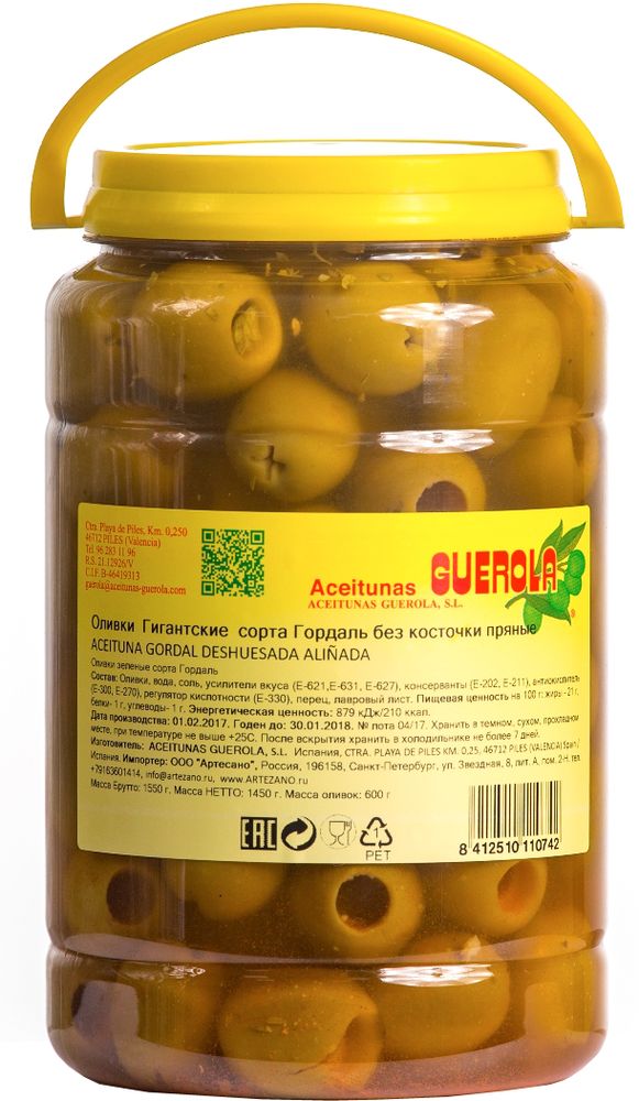 Guerola оливки зеленые Годаль пряные калибр 80/100 без косточки, 600 г8412510110742 Guerola оливки зеленые Годаль пряные калибр 80/100 без косточки, 600 г8412510110742Оливки зеленые Годаль (или королевские оливки) калибром 80/100 с перцем без косточки от испанской семейной компании GUEROLA, которая была основана еще в конце 19 века в Валенсии Рафаэлем Гуэрола и до сих пор ее возглавляют члены семьи. Предприятие выпускает оливки различных видов по традиционных испанским рецептам, консервированные перцы, каперсы и ассорти из этих продуктов. Эти оливки самые большие из существующих на испанском рынке (размером с небольшую сливу). Сорт Гордаль произрастает только в Испании и Греции, но испанские ценятся значительно выше за его тонкую текстуру, гармоничный вкус и косточку маленького размера. В процессе приготовления добавляется немного перца, что придает оливкам пряные ноты. Прекрасно сочетается с плотной едой и хорошим темным вином. Прекрасны как самостоятельное блюдо, так и компонент для салатов, пиццы, бутербродов, канапэ, а также в качестве украшения закусок и соусов