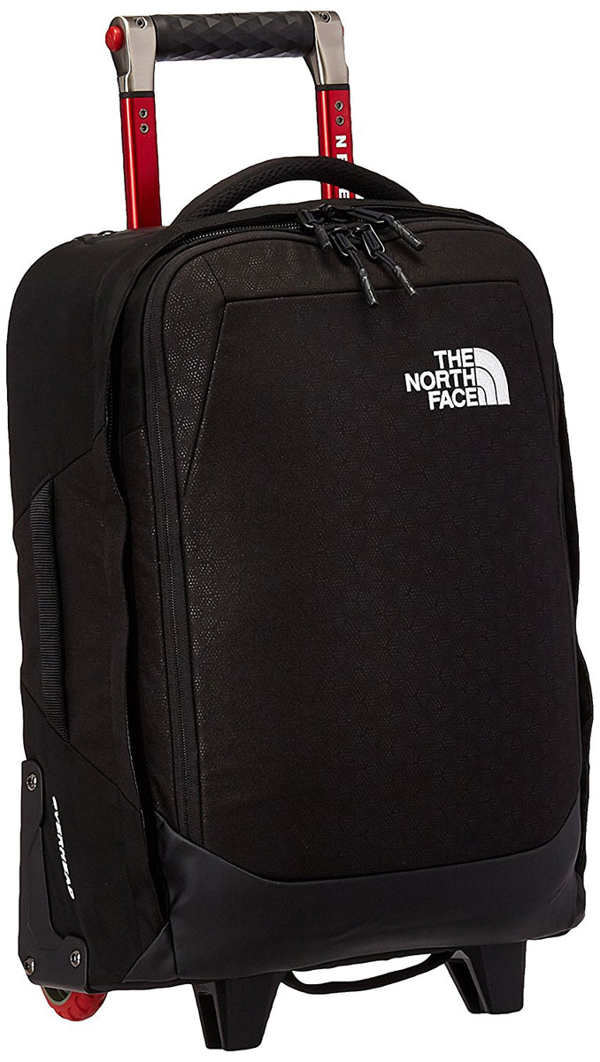 Сумка дорожная The North Face Overhead, цвет: черный. T92T7BSEQT92T7BSEQ Сумка дорожная The North Face Overhead, цвет: черный. T92T7BSEQT92T7BSEQДорожная сумка Overhead объемом 29 литров - стильная, достаточно вместительная, чтобы упаковать все необходимое на один два-дня путешествия, в то же время компактная и удобная в транспортировке. В сумке есть мягкое отделение для ноутбука диагональю 15. В основном отделении сетчатый карман на молнии. Удобная телескопическая ручка и четыре ручки для переноски. Прочные колеса с плавным ходом. Защитные вставки из пластика в местах повышенных нагрузок. U-молния в основном отделении с широким раскрытием. Внутренний сетчатый карман на молнии.