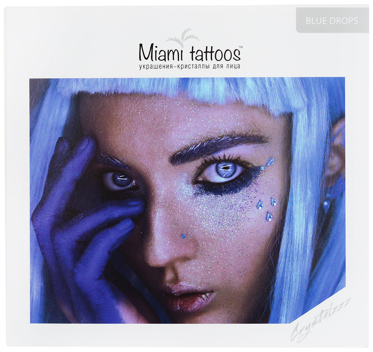 Miami Tattoos Клеящиеся кристаллы для лица Crystalzzz Drops in Blue, 1 лист 15см*16смMT0055 Miami Tattoos Клеящиеся кристаллы для лица Crystalzzz Drops in Blue, 1 лист 15см*16смMT0055Miami Tattoos - это дизайнерские переводные тату-украшения. Коллекция кристаллов Crystalzzz — это модный аксессуар для вашей кожи, который наносится за считанные секунды. Больше вам не нужна помощь визажиста, чтобы создать необычный макияж. Просто отклейте кристаллы от прозрачной пленки и приклейте их на чистую кожу. Crystalzzz можно наносить как на лицо, так и на тело. Они не вызывают аллергию и абсолютно безопасны для кожи.