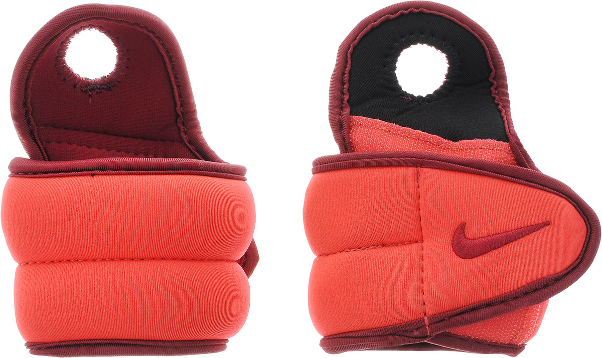 Утяжелитель для запястья Nike Wrist Weights, цвет: красный, бордовый, 0,45 кгN.EX.06.677.OS Утяжелитель для запястья Nike Wrist Weights, цвет: красный, бордовый, 0,45 кгN.EX.06.677.OSРегулируемая застежка на липучке обеспечивает неподвижную посадку аксессуара. Быстросохнущая подкладка Fit Dry быстро впитывает влагу, что позволяет оставаться коже всегда сухой и не потеть. Модель имеет преимущество перед универсальными утяжелителями за счет анатомически комфортной конструкции, обеспечивающей идеальную посадку на запястье. 0,45 кг.