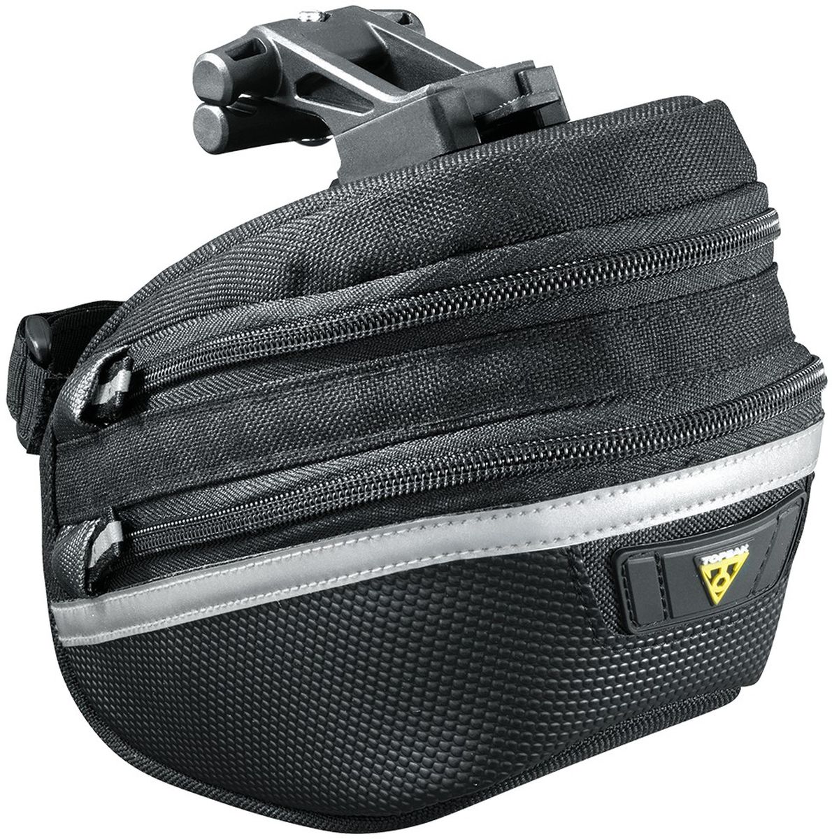 Сумка подсeдельная TOPEAK Wedge Pack II, с креплением, c чехлом, большаяTC2273B Сумка подсeдельная TOPEAK Wedge Pack II, с креплением, c чехлом, большаяTC2273BВысококачественная подседельная сумка с регулируемым объемом ( 1.25-1.65 L ). Пошита из прочнейшего материала, имеет светоотражающую полосу, крепление для мигалки и чехол от дождя. Емкость: 1.25-1.65 L. Система крепления QuickClick (быстросьемный механизм). Особенности: -регулируемый объем (для увеличения объема необходимо расстегнуть молнию); -светоотражающая полоса 3М; -крепление для мигалки; -чехол от дождя. Крепление: QuickClick (F25) к рамке седла и ремень на подседельный штырь. Материал: Нейлон. Размер: 18.5 x 11.5 x 13 см. Вес: 183 г.