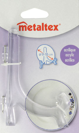 Подставка для тарелок Metaltex 9-18 см.29.91.10 Подставка для тарелок Metaltex 9-18 см.29.91.10Удобная настольная подставка Metaltex для декоративных тарелок выполнена из пластмассы. Подставку можно регулировать под необходимый размер тарелки (от 9 см до 18 см). Такая подставка поможет оригинально украсить интерьер вашей кухни. Характеристики: Материал: пластмасса. Высота подставки: 11 см. Производитель: Италия. Артикул: 29.91.10.