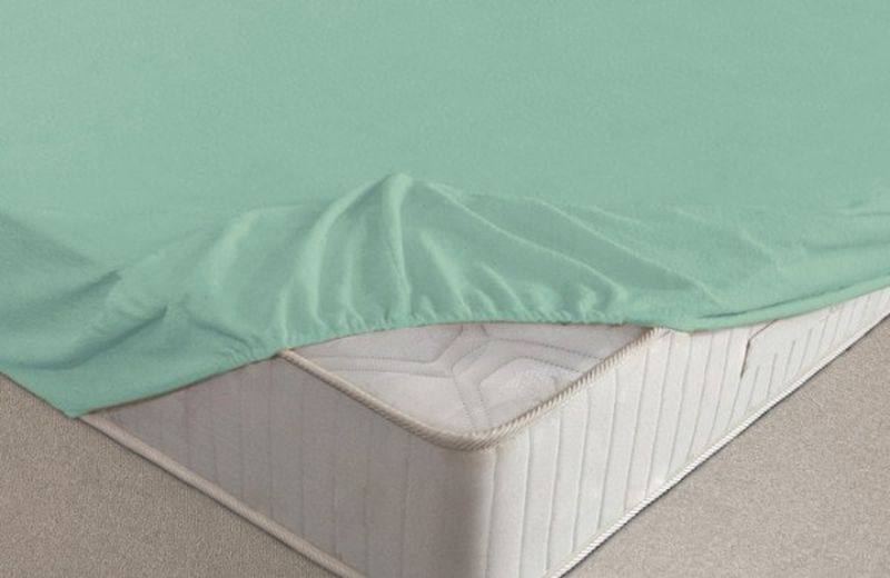 Простыня на резинке Ecotex, махровая, цвет: ментоловый, 180 х 200 смПРМ18 ментоловый Простыня на резинке Ecotex, махровая, цвет: ментоловый, 180 х 200 смПРМ18 ментоловыйМахровые простыни на резинке сшиты из высококачественного махрового полотна, окрашены стойкими экологически безопасными красителями. Они уже успели завоевать признание потребителей благодаря своим практичным характеристикам. Имеют резинку по всему периметру, что даёт возможность надежно зафиксировать простыню на матрасе, тем самым создавая здоровый и комфортный сон. Натяжные махровые простыни довольно практичны, т.к. махровое полотно долговечно. Выолнены из 100% хлопка и не содержат синтетических добавок.
