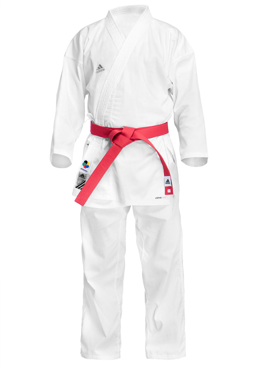 Кимоно для каратеK220K Кимоно для каратеK220KКимоно для карате adidas Combat WKF состоит из рубашки и брюк. Просторная рубашка с глубоким запахом, боковыми разрезами и рукавом три четверти завязывается специальными завязками. Боковые швы и края полочек укреплены дополнительными строчками. На пинке предусмотрена вентиляция. Просторные брюки особого покроя на широком поясе и шнурком для фиксации брюк на талии. Длинный плотный пояс укреплен многорядной прострочкой. Чуть ниже пояса предусмотрена вентиляция. Комплект изготовлен из хлопка с добавлением полиэстера. Кимоно рекомендуется для тренировок в зале. Уважаемые клиенты, при выборе размера кимоно нужно ориентироваться на формулу: Размер кимоно = рост человека + 10 см. Пример: Рост человека 170 см +10 см = размер кимоно 180 см.