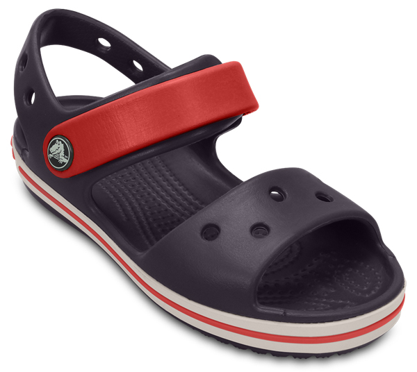 Сандалии12856-485 Сандалии12856-485Прелестные сандалии Crocband от Crocs очаруют вашего ребенка с первого взгляда! Модель выполнена из полимера Croslite и дополнена по периметру подошвы контрастной полоской с названием бренда. Благодаря материалу Croslite обувь невероятно легкая, мягкая и удобная. Материал Croslite - бактериостатичен, препятствует появлению неприятных запахов и легок в уходе: быстро сохнет и не оставляет следов на любых поверхностях. Верх модели оформлен отверстиями, которые можно использовать для украшения джибитсами. Под воздействием температуры тела обувь принимает форму стопы. Ремешок с застежкой-липучкой, оформленный фирменным логотипом, обеспечивает надежную фиксацию модели на ноге. Рельефная поверхность верхней части подошвы комфортна при движении. Рифленое основание подошвы гарантирует идеальное сцепление с любой поверхностью. Такие сандалии принесут комфорт и радость вашему ребенку.