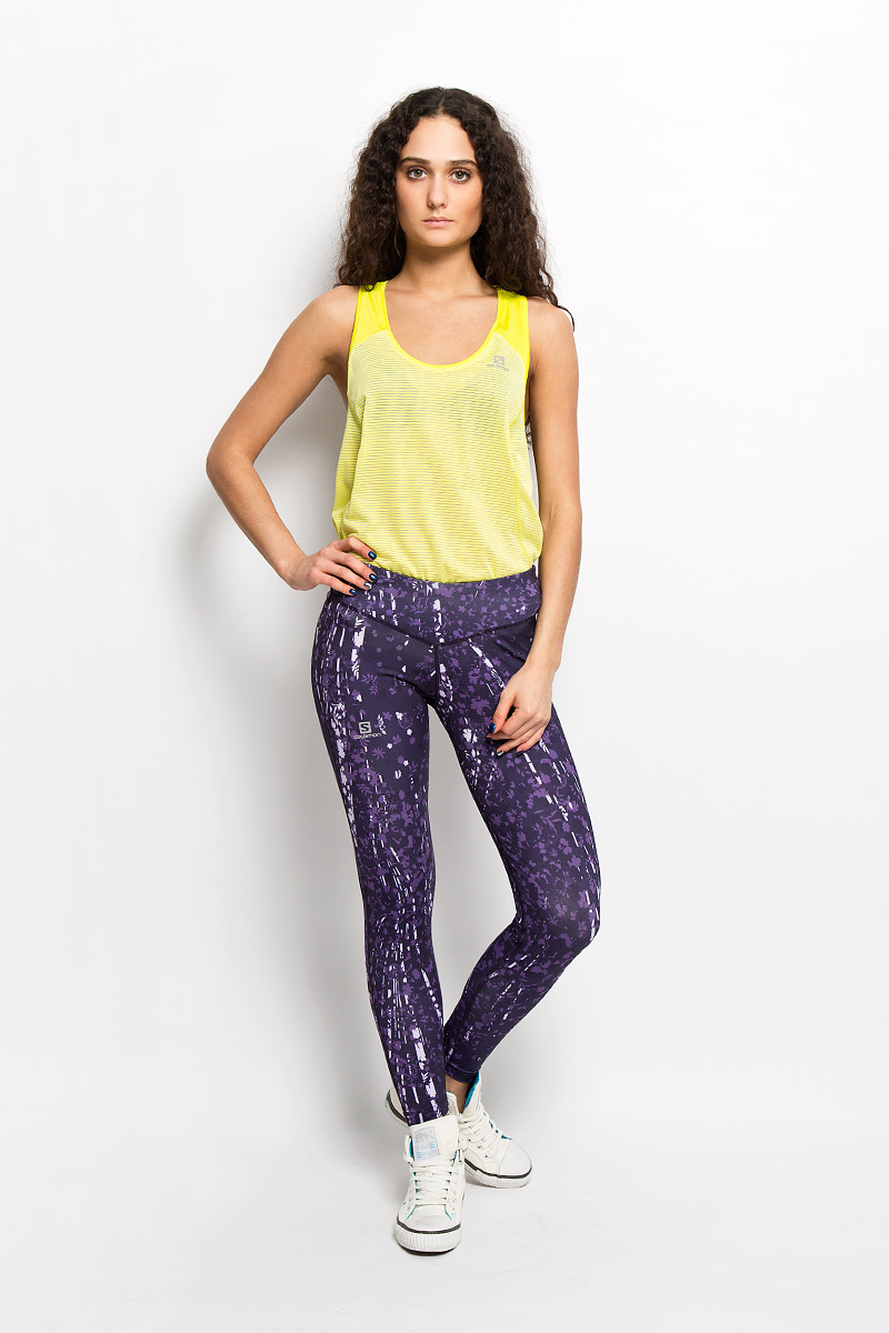 Тайтсы женские Elevate 7/8 Tight W. L37957200L37957200 Тайтсы женские Elevate 7/8 Tight W. L37957200L37957200Стильные женские тайтсы Salomon Elevate 7/8 Tight W, изготовленные из износостойкого приятного на ощупь эластичного материала с оригинальным цветочным принтом, предназначены фитнеса или йоги. Модель с комфортными плоскими швами, широкий пояс гарантирует идеальную и удобную посадку по любой фигуре и завязывается на текстильный шнурок. Модель идеально прилегает к телу и подчеркивает достоинства фигуры, абсолютно не сковывая движений. Сзади изделие оснащено втачным карманом на скрытой застежке-молнии. По низу модель дополнена сборкой на резинке.