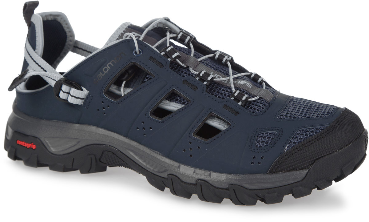 Кроссовки379554 Кроссовки379554Комфортные и износостойкие кроссовки от Salomon Evasion Cabrio отлично подходят для активного отдыха в сырую или сухую погоду жарким летом. Верх изделия выполнен из синтетики, которая выглядит, как кожа, но быстро сохнет, и дополнен вставками из сетчатого текстиля. По бокам модель оформлена перфорацией для лучшей воздухопроницаемости. Система быстрой шнуровки Quicklace с фиксатором и регулируемый ремешок с пластиковой пряжкой в области пятки гарантируют надежную фиксацию обуви на ноге. Накладка на мыске обеспечит лучшую защиту пальцев. Текстильная подкладка и стелька из ЭВА материала с текстильным верхним покрытием подарят дополнительный комфорт и предотвратят натирание. Язычок дополнен фирменной текстильной нашивкой, одна из боковых сторон - принтом в виде названия бренда. Ярлычок, оформленный символикой бренда, предназначен для более удобного надевания обуви. Задник складной. Технология Contagrip обеспечивает надежность сцепления и высокую износостойкость...