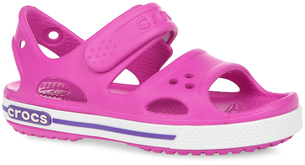 Сандалии для девочки Crocband II. 14854-6N414854-6N4 Сандалии для девочки Crocband II. 14854-6N414854-6N4Модные сандалии Crocband II от Crocs очаруют вашу девочку с первого взгляда! Модель выполнена из полимера Croslite и дополнена по периметру подошвы контрастной полоской с названием бренда. Благодаря материалу Croslite обувь невероятно легкая, мягкая и удобная. Материал Croslite - бактериостатичен, препятствует появлению неприятных запахов и легок в уходе: быстро сохнет и не оставляет следов на любых поверхностях. Верх модели оформлен отверстиями, которые можно использовать для украшения джибитсами. Под воздействием температуры тела обувь принимает форму стопы. Ремешок с застежкой-липучкой, оформленный названием бренда, обеспечивает надежную фиксацию модели на ноге. Рельефная поверхность верхней части подошвы комфортна при движении. Рифленое основание подошвы гарантирует идеальное сцепление с любой поверхностью. Такие сандалии принесут комфорт и радость вашему ребенку.