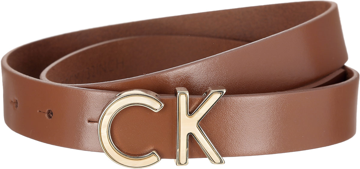 РеменьK60K601620_0010 РеменьK60K601620_0010Стильный женский ремень Calvin Klein станет великолепным дополнением к любому образу. Ремень изготовлен из натуральной кожи и оформлен декоративной пряжкой в виде букв CK. Ширина изделия дает возможность эффективно применять его с джинсами, брюками или верхней одеждой. Длина ремня регулируется. В комплект входит фирменный чехол. Такой ремень шикарно дополнит образ и не перегрузит его лишними деталями, а также позволит вам подчеркнуть свой вкус и индивидуальность.