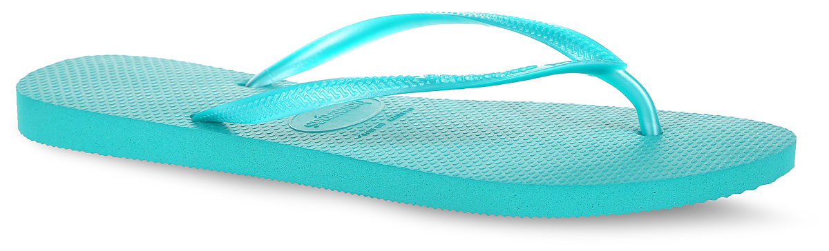 Сланцы женские Slim. 40000304000030-0001 Сланцы женские Slim. 40000304000030-0001Модные сланцы Slim от Havaianas придутся вам по душе. Верх модели, выполненный из резины, оформлен рельефным орнаментом и названием бренда. Ремешки с перемычкой гарантируют надежную фиксацию модели на ноге. Подошва выполнена из материала ЭВА. Рифление на верхней поверхности подошвы предотвращает выскальзывание ноги. Рельефное основание подошвы обеспечивает уверенное сцепление с любой поверхностью. Удобные сланцы прекрасно подойдут для похода в бассейн или на пляж.