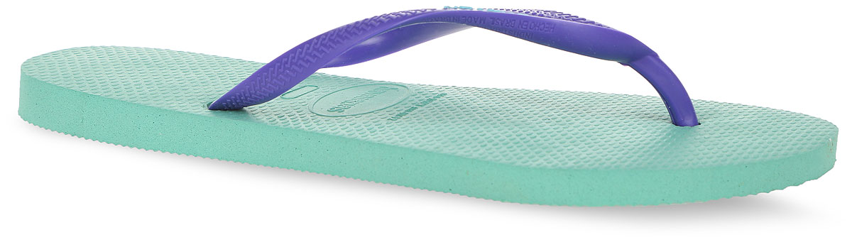 Сланцы4119787-1422 Сланцы4119787-1422Модные сланцы Slim Logo от Havaianas придутся вам по душе. Верх модели, выполненный из резины, оформлен рельефным орнаментом и названием бренда. Ремешки с перемычкой гарантируют надежную фиксацию модели на ноге. Подошва выполнена из материала ЭВА. Рифление на верхней поверхности подошвы предотвращает выскальзывание ноги. Рельефное основание подошвы обеспечивает уверенное сцепление с любой поверхностью. Удобные сланцы прекрасно подойдут для похода в бассейн или на пляж.