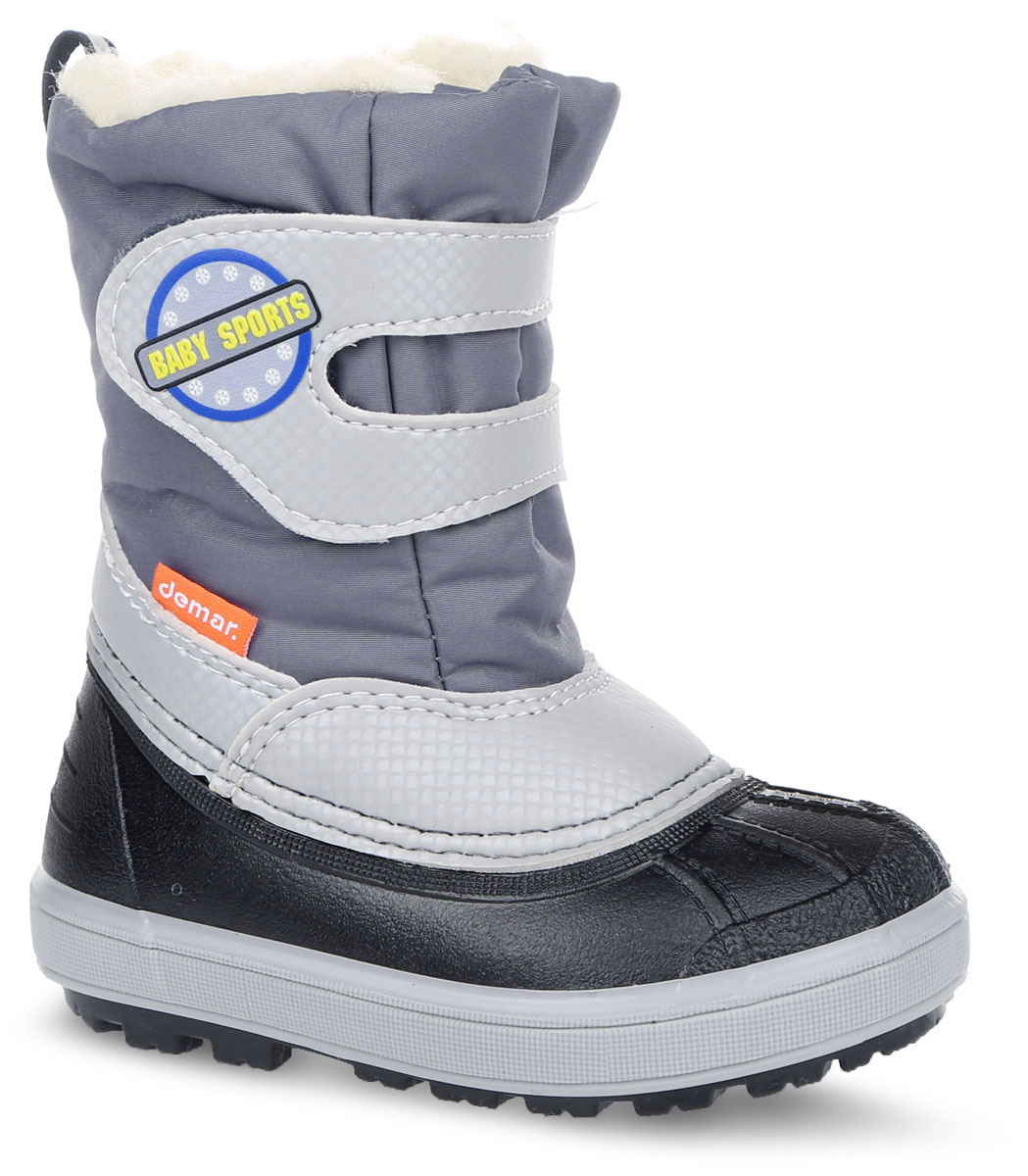 Дутики детские. 1506 BABY SPORT D1506 BABY SPORT D Дутики детские. 1506 BABY SPORT D1506 BABY SPORT DТеплые и удобные дутики фирмы Demar не оставят равнодушным вашего ребенка. Они выполнены из водонепроницаемого текстиля и ПВХ. Модель оформлена накладками со светоотражателями и значком с надписью Baby Sports. На ноге модель фиксируется с помощью удобного ремешка с застежкой-липучкой. Ярлычок на заднике облегчает надевание обуви. Подкладка и стелька выполнены из комбинированных материалов: натуральная шерсть, текстиль, фетр, войлок. Подошва изготовлена из качественной термопластичной резины и ПВХ, а ее рифление гарантирует отличное сцепление с любой поверхностью. Такие дутики отлично защитят ножки вашего ребенка от мороза.