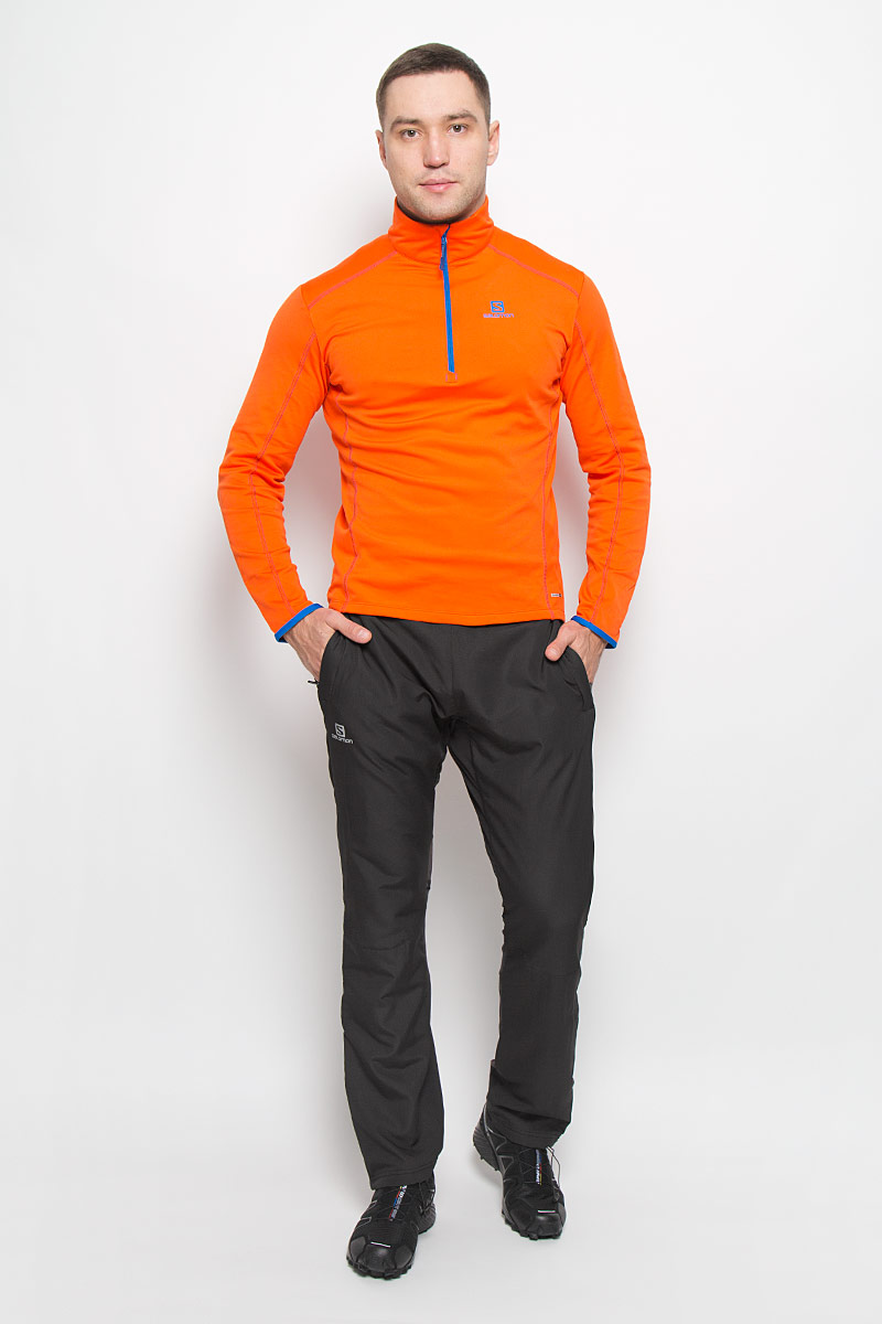 Брюки спортивныеL38298600 Брюки спортивныеL38298600Мужские брюки Escape Pant от Salomon идеально подойдут для занятий зимними видами спорта. Модель изготовлена из высококачественного полиэстера, задняя часть - из нейлона с добавлением эластана. Благодаря технологии Advanced Skin Shield материал защищает от проникновения ветра и хорошо пропускает воздух. Подкладка выполнена из полиэстера. В качестве утеплителя используется полиэстер. Брюки прямого кроя имеют широкий эластичный пояс с эластичным шнурком. Спереди находятся два втачных кармана с застежками-молниями. Ширина нижней части штанин регулируется за счет застежек-молний.