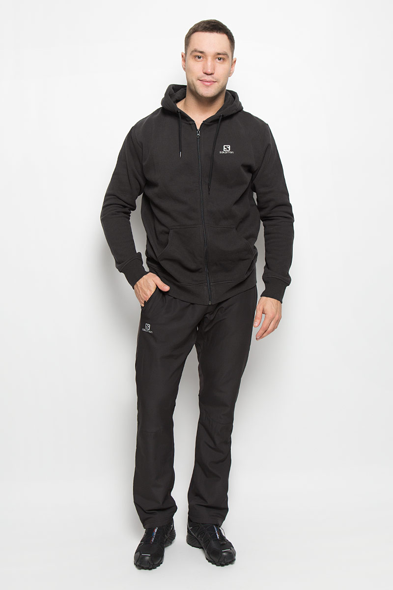 ТолстовкаL36177600 ТолстовкаL36177600Мужская толстовка Salomon Logo Fz с длинными рукавами и капюшоном изготовлена из хлопка с добавлением полиэстера, изнаночная сторона отделана мягким флисовым материалом. Объем капюшона регулируется при помощи шнурка-кулиски. Манжеты рукавов и низ толстовки оснащены эластичными резинками. Спереди толстовка дополнена двумя накладными карманами и украшена небольшим принтом с логотипом бренда. Модель застегивается на застежку-молнию спереди.