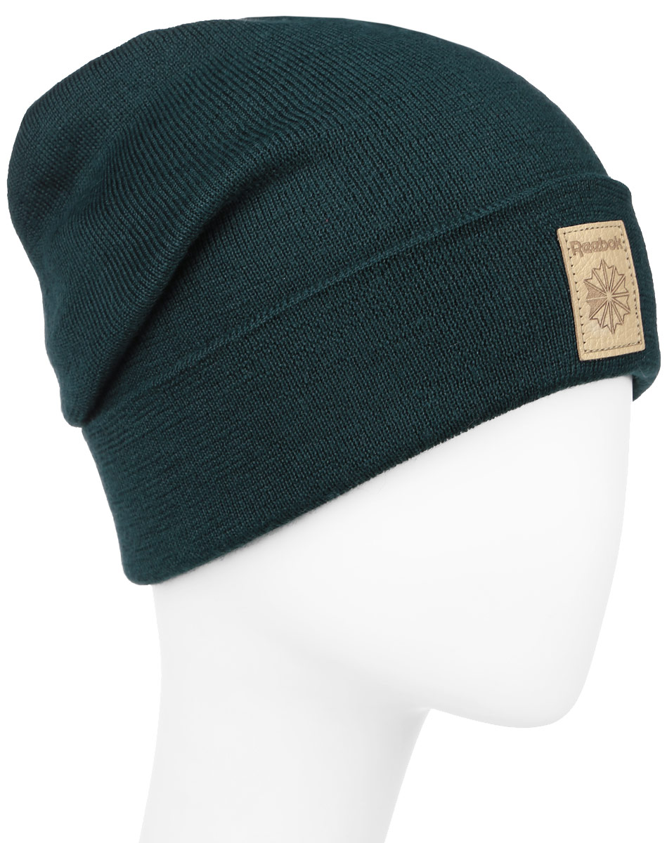 ШапкаAX9977 ШапкаAX9977Стильная шапка Reebok Classics Foundation Beanie выполнена из акрила с добавлением шерсти и с подкладкой из натурального хлопка. Шапка оформлена небольшой вышивкой с фирменным логотипом. Уважаемые клиенты! Размер, доступный для заказа, является обхватом головы.