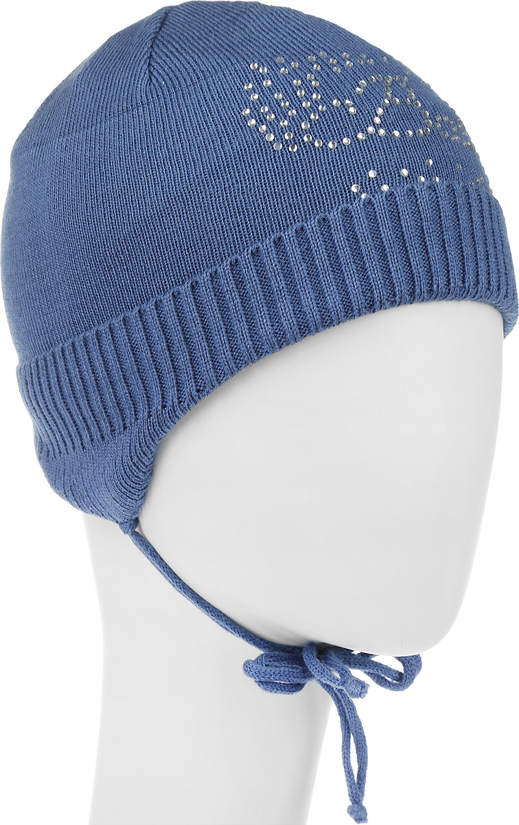 Шапка детскаяK035-22 Шапка детскаяK035-22Теплая шапка для девочки InFante отлично дополнит образ в холодную погоду. Выполнена модель из натурального хлопка. Оформлено изделие аппликацией из стразов. По бокам модель немного удлинена и имеет завязки на шнурочках, а на макушке дополнена стразом. Уважаемые клиенты! Размер, доступный для заказа, является обхватом головы.