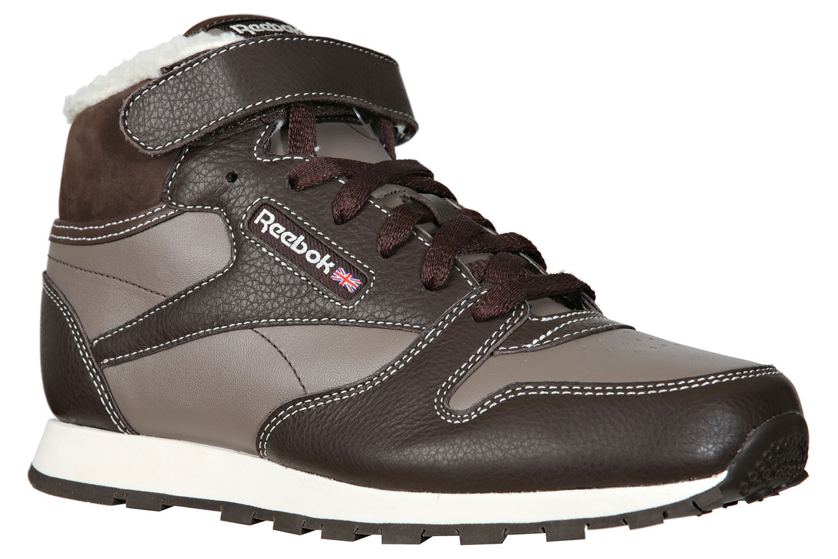 КроссовкиM46338 КроссовкиM46338Утепленные кроссовки Reebok Cl Lthr Mid Strap выполнены из натурального спилка, подкладка из искусственного меха, текстильная стелька. Детали: удобная функциональная шнуровка, кожаные вставки, анатомическая стелька и промежуточная подошва из ЭВА амортизируют ударную нагрузку. Уникальный рисунок протектора подошвы обеспечивает непревзойденное сцепление.