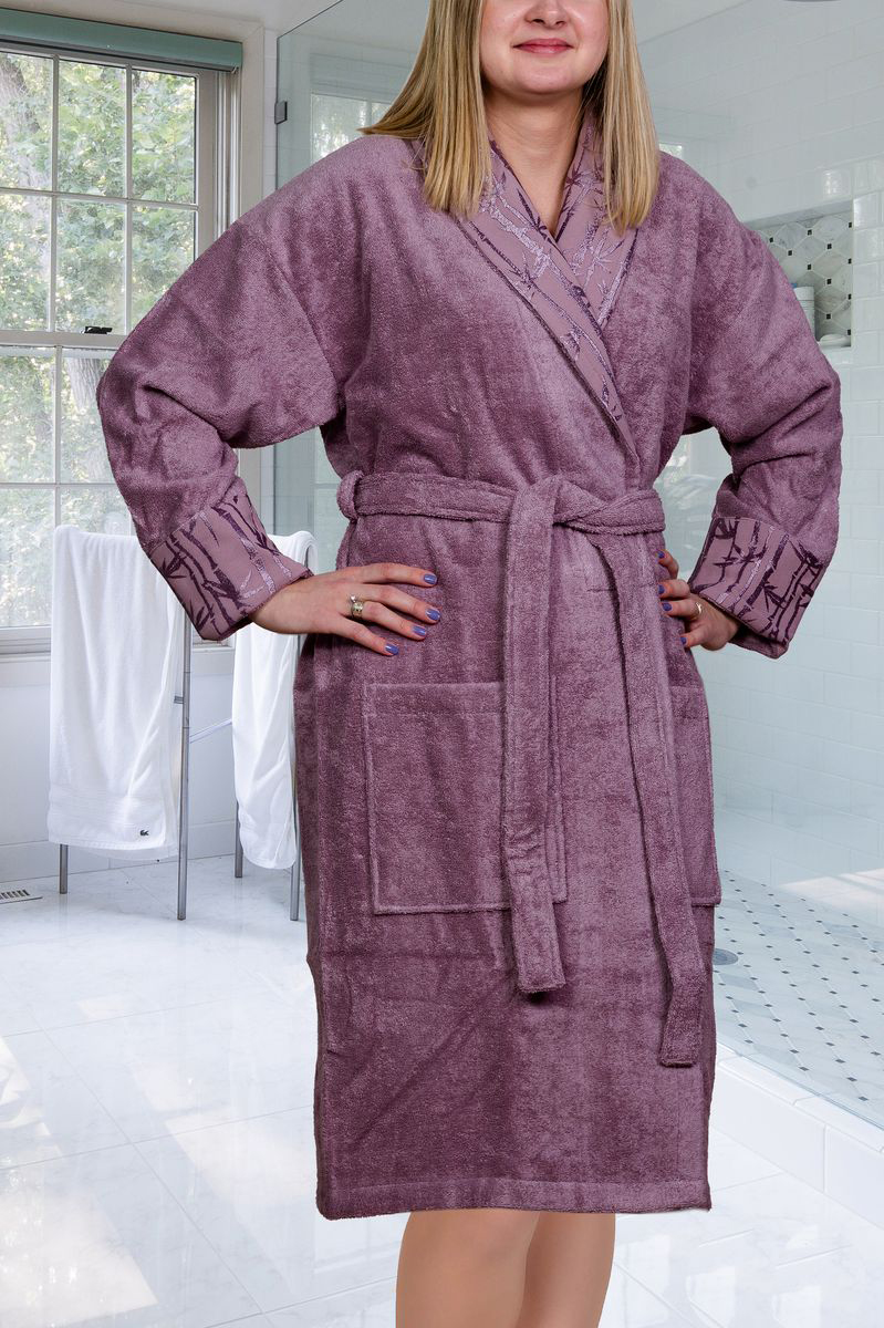 ХалатEliza ХалатElizaХалат женский Hobby Home Collection Eliza с воротником шаль выполнен из плотной бархатистой ткани - смеси хлопка и бамбукового волокна. Халат с запахом на поясе имеет два накладных кармана. Халат оформлен вышивкой в виде бамбуковых побегов по периметру воротника и на манжетах. Отлично впитывает влагу, пропускает воздух и прост в уходе. Удобен как в носке дома постоянно, так и в эксплуатации после приема ванны или душа. Мягкий пояс прилагается.