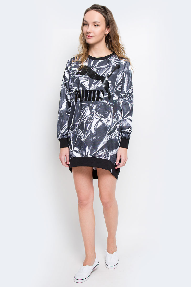 Платье571477_24 Платье571477_24Платье Puma AOP Dress выполнено из хлопкового трикотажа. Модель с круглым вырезом, рукавами-реглан дополнена двумя карманами по бокам.