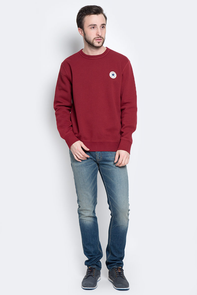 Толстовка10002133035 Толстовка10002133035Мужская толстовка Converse Core Crew Neck с длинными рукавами и круглым вырезом горловины. Толстовка изготовлена из качественного хлопка с добавлением полиэстера. Горловина, манжеты рукавов и низ модели дополнены трикотажными резинками. Изделие оформлено фирменной нашивкой на груди, а внутренняя сторона выполнена на мягком флисе.