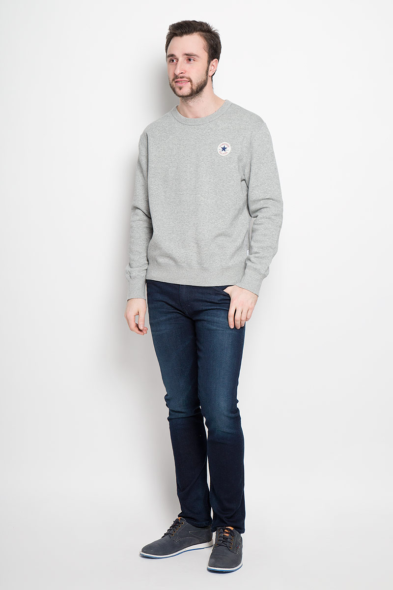 Толстовка10002133035 Толстовка10002133035Мужская толстовка Converse Core Crew Neck с длинными рукавами и круглым вырезом горловины. Толстовка изготовлена из качественного хлопка с добавлением полиэстера. Горловина, манжеты рукавов и низ модели дополнены трикотажными резинками. Изделие оформлено фирменной нашивкой на груди, а внутренняя сторона выполнена на мягком флисе.