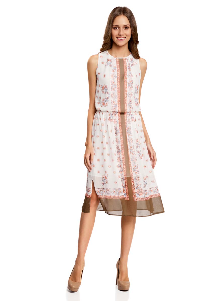 Платье21900320/42840/1266E Платье21900320/42840/1266EПлатье oodji Collection изготовлено из качественного полиэстера. Модель с круглым вырезом и без рукавов застегивается сзади на пуговицу. На талии ткань собрана на внутреннюю резинку, по бокам имеются разрезы. Шифоновое платье оформлено оригинальным платочным рисунком. Модель дополнена подкладкой.