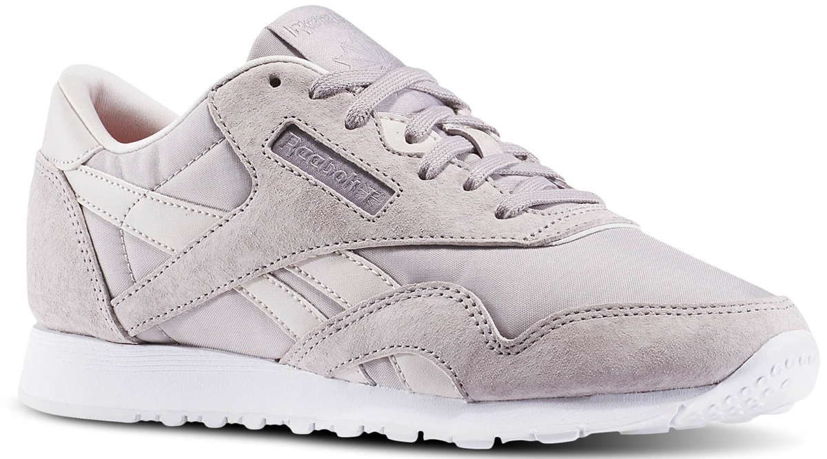 КроссовкиBD2682 КроссовкиBD2682Утонченный силуэт кроссовок Reebok Cl Nylon X Face - основа самого яркого образа. Дизайн в коллаборации с брендом FACE Stockholm выводит эту оригинальную модель на новый уровень. Замша и нейлон отлично дополняют классический образ. Низкий дизайн создает классический образ. Формованная промежуточная подошва из ЭВА обеспечивает оптимальную амортизацию. Стойкая к истиранию резиновая подошва отличается высокой прочностью. Формованная стелька из пеноматериала для дополнительной амортизации и комфорта