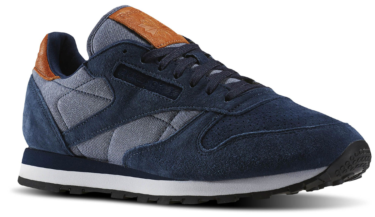 КроссовкиBD1663 КроссовкиBD1663Кроссовки Classic Leather Chambray . Благодаря сочетанию замши и материала шамбре эти кроссовки можно смело назвать новым словом в повседневном стиле. Классический дизайн, комфортные материалы и интересные кожаные детали. Эти кроссовки - живое воплощение классики и винтажного стиля Стильный и мягкий верх из шамбре и замши Низкий верх для свободы движений Штампованная промежуточная подошва из ЭВА и стелька из пеноматериала обеспечивают легкость, амортизацию и комфорт Интересные кожаные детали на заднике и язычке говорят о качестве и стиле Стойкая к истиранию прочная резиновая подметка обеспечивает отличное сцепление