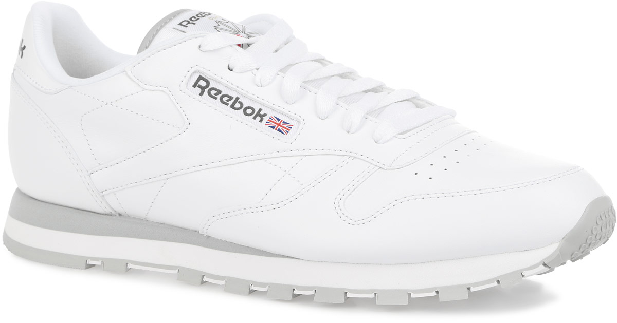Кроссовки2214 Кроссовки2214Стильные мужские кроссовки от Reebok CLassic Leather отличаются легкостью и оригинальным дизайном. Изделие выполнено из натуральной кожи и оформлено по верху прострочкой, фактурными швами и легкой перфорацией на мысе. Язычок - из текстиля. Низкий дизайн предназначен для полной свободы движений. Подкладка и стелька, исполненные из текстиля, способствуют поддержанию оптимального микроклимата, сохраняя ощущение комфорта и сухости. Верх кроссовок оформлен шнуровкой, которая гарантирует надежную фиксацию изделия. На заднике обувь декорирована принтом в виде логотипа бренда. Сбоку модель дополнена вставкой из текстиля, а язычок - нашивкой с логотипом бренда. Формованная промежуточная подошва ЭВА обеспечивает амортизацию без утяжеления. Подошва с рельефным протектором обеспечивает сцепление с любой поверхностью. Оригинальные кроссовки придутся вам по душе.