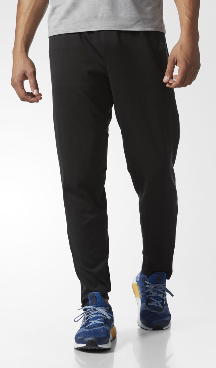 Брюки спортивныеS99007 Брюки спортивныеS99007Брюки adidas Performance RS W ASTRO PT M выполнены из гладкого трикотажа и утеплены флисом с внутренней стороны. Ткань с технологией Climawarm сохраняет тепло. Детали: широкий эластичный пояс на кулиске, два кармана спереди, один карман на молнии сзади, низ брючин на молнии, светоотражающий логотип.