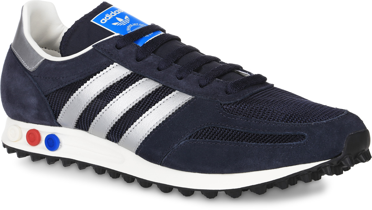 КроссовкиBB1206 КроссовкиBB1206Мужские кроссовки adidas Originals La Trainer Og выполнены из натуральной кожи разной текстуры и текстиля. Модель оформлена фирменными нашивками. Шнурки надежно зафиксируют модель на ноге. Кроссовки оснащены системой с регулировкой амортизации задней части стопы. Внутренняя поверхность из сетчатого текстиля комфортна при движении. Стелька выполнена из легкого ЭВА-материала с поверхностью из текстиля. Подошва изготовлена из высококачественной резины и дополнена протектором.