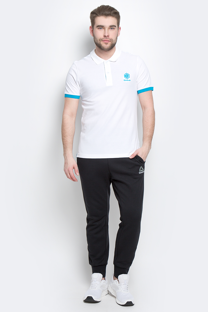 ПолоBK515 ПолоBK515Мужское поло Reebok F Polo изготовлено из натурального хлопка. Модель с короткими рукавами и отложным воротником застегивается спереди на две пуговицы. Передняя часть декорирована оригинальной вышивкой. Манжеты рукавов дополнены трикотажными резинками контрастного цвета. По бокам поло дополнено небольшими разрезами. Спинка слегка длиннее передней части поло. Стильное и современное оформление этой модели заметно подчеркнет вашу индивидуальность.