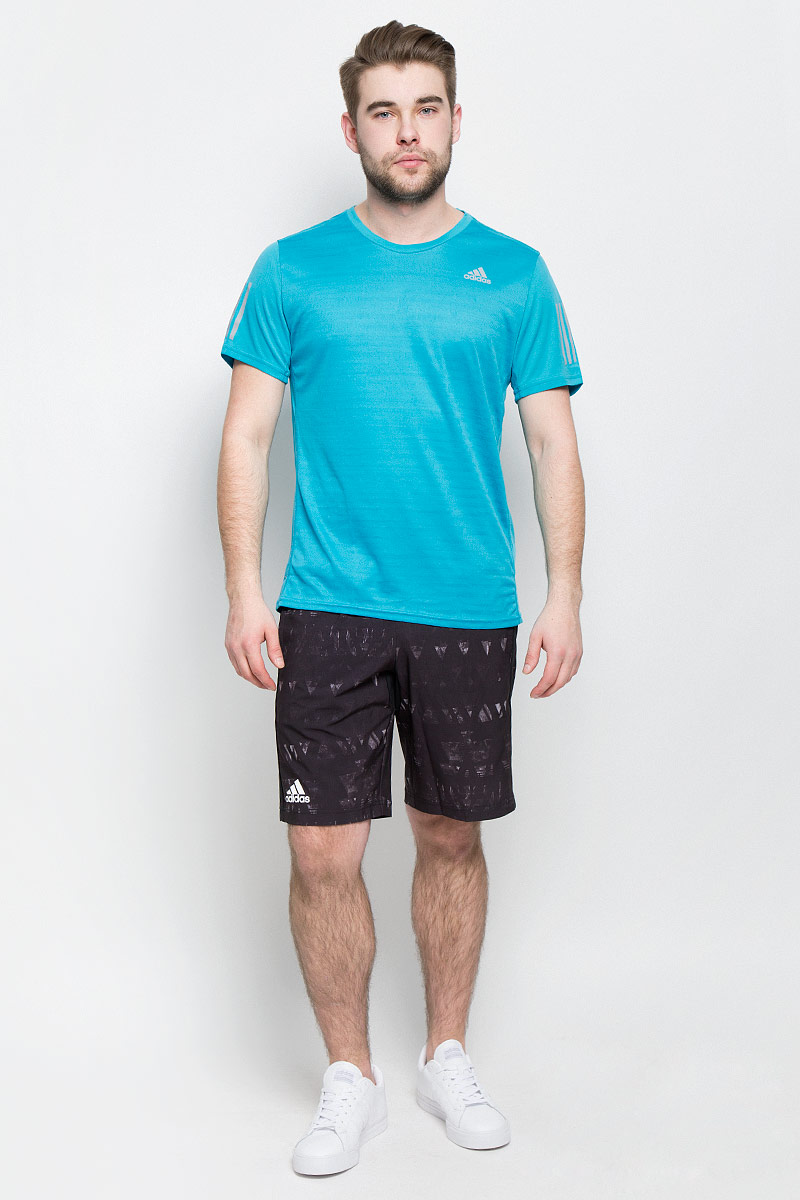 ФутболкаBP7422 ФутболкаBP7422Мужская спортивная футболка Adidas Rs Ss Tee M изготовлена из полиэстера с добавлением полиэфира по технологии climalite, что обеспечивает быстрое влагоотведение с поверхности тела. Модель с круглой горловиной и короткими рукавами. Однотонная футболка декорирована принтом с логотипом бренда и светоотражающими полосами на рукавах.