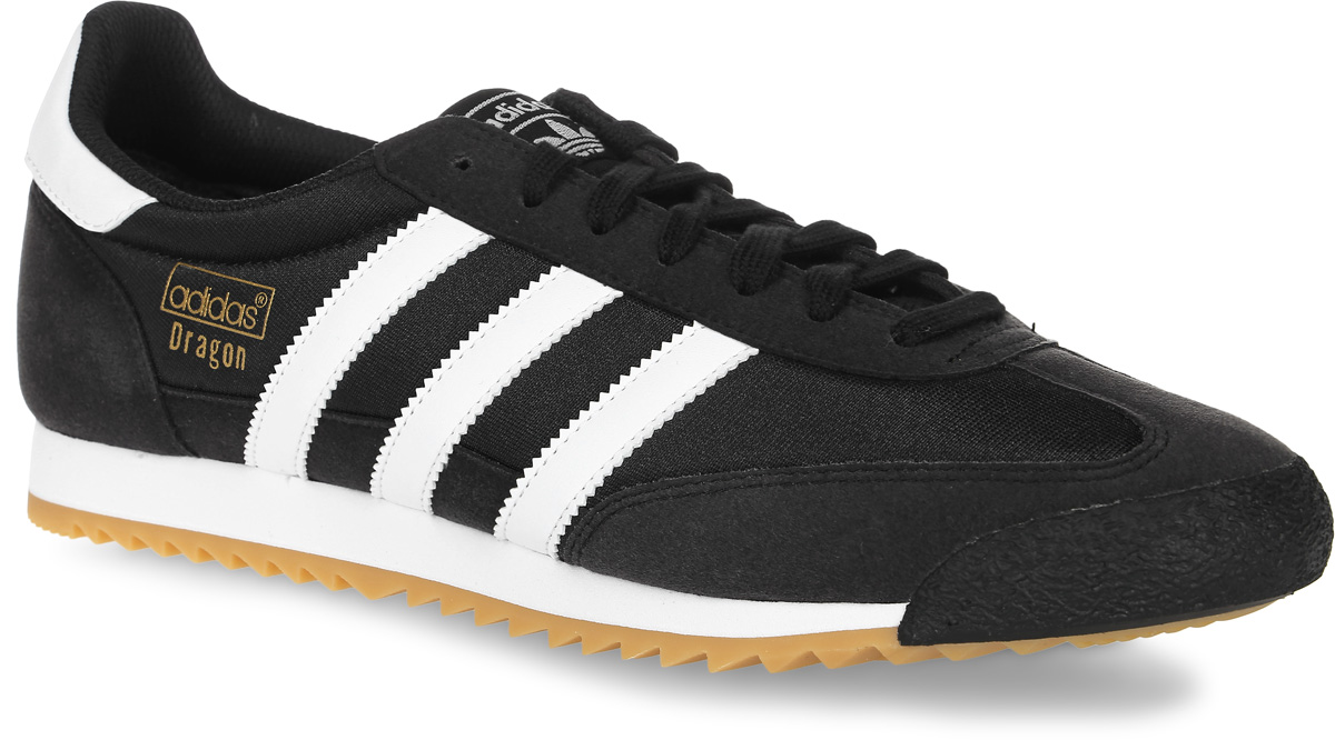 КроссовкиBB1266 КроссовкиBB1266Мужские кроссовки adidas Originals Dragon Og выполнены из текстиля и оформлены фирменными нашивками из искусственной кожи. Шнурки надежно зафиксируют модель на ноге. Внутренняя поверхность из текстиля комфортна при движении. Стелька выполнена из легкого ЭВА-материала с поверхностью из текстиля. Подошва изготовлена из высококачественной резины и дополнена рельефным рисунком.