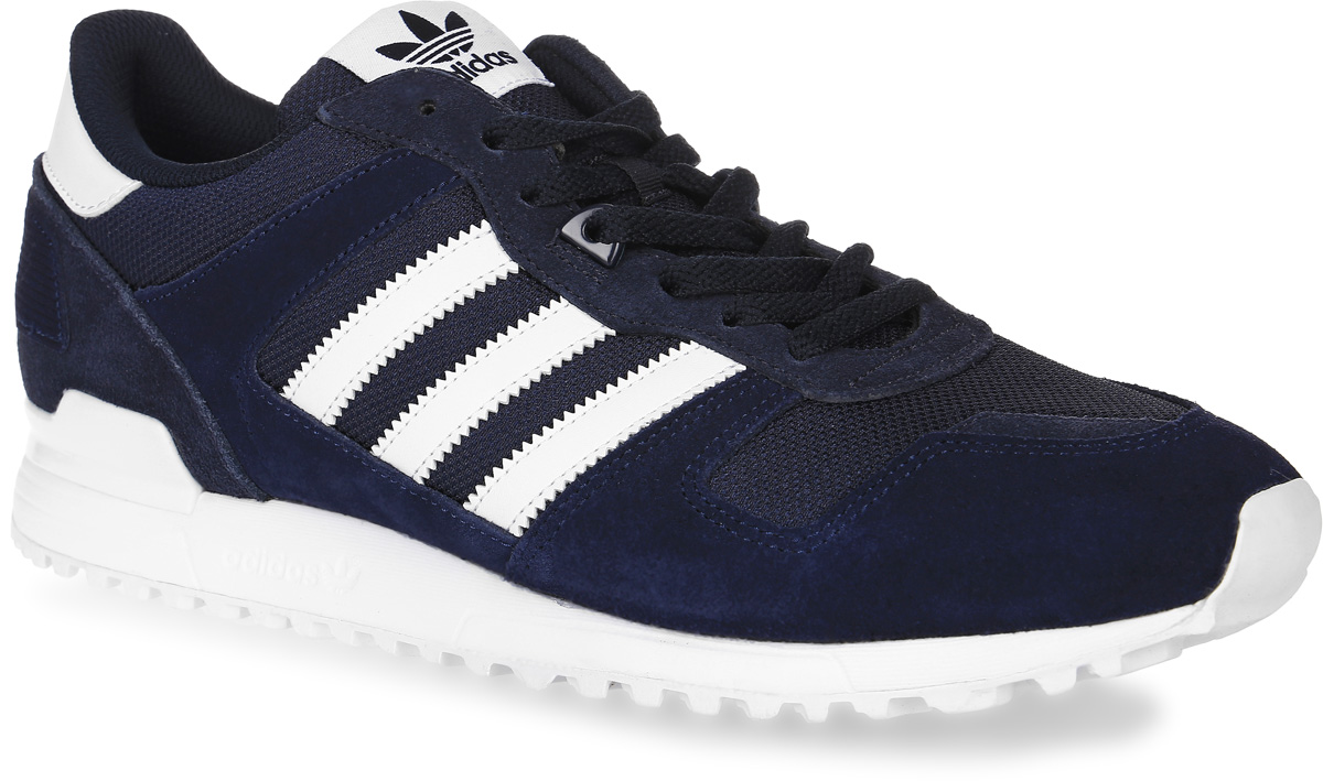 КроссовкиBB1212 КроссовкиBB1212Мужские кроссовки adidas Originals Zx 700 выполнены из натуральной замши, текстиля и искусственной кожи. Модель оформлена фирменными нашивками. Шнурки надежно зафиксируют модель на ноге. Внутренняя поверхность из сетчатого текстиля комфортна при движении. Стелька выполнена из легкого ЭВА-материала с поверхностью из текстиля. Подошва изготовлена из высококачественной резины и дополнена рельефным рисунком.