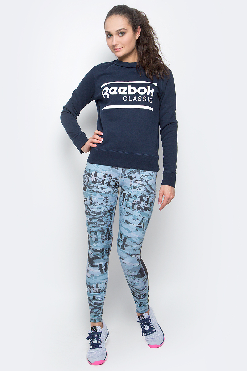 СвитшотBK2408 СвитшотBK2408Свитшот F Iconic Crew Sweat от Reebok выполнен из мягкой хлопковой ткани. Плоские швы сводят к минимуму риск натирания. У модели воротник, манжеты и подол на резинке в рубчик для оптимальной посадки. Ворот дополнен оригинальной окантовкой. Спереди изделие декорировано принтом в виде логотипа бренда.