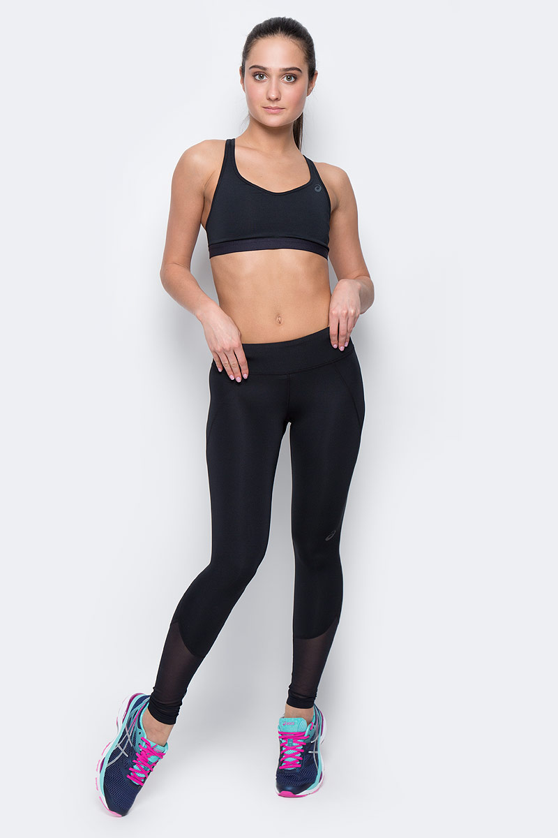 Тайтсы140941-0904 Тайтсы140941-0904Женские тайтсы для фитнеса Asics Panel Tight изготовлены из высококачественного эластичного полиэстера, они великолепно тянутся, не сковывают движения, обеспечивают необходимую циркуляцию воздуха и превосходно отводят влагу от тела, оставляя кожу сухой и обеспечивая наибольший комфорт. Облегающие тайтсы дополнены широкой эластичной резинкой на талии. Комфортные плоские швы исключают риск натирания даже во время интенсивных занятий спортом. По низу брючин расположены сетчатые вставки.