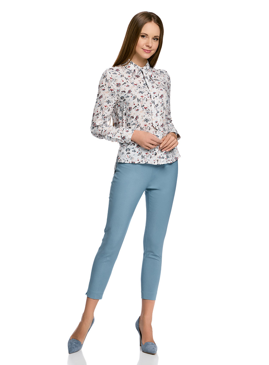 Брюки11703095/33574/2900N Брюки11703095/33574/2900NЖенские укороченные брюки oodji Ultra выполнены из высококачественного материала. Зауженная модель стандартной посадки застегивается сбоку на застежку-молнию.