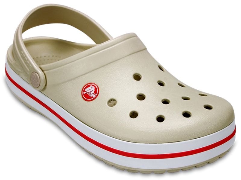 Сабо11016-100 Сабо11016-100Модные сабо Crocband от Crocs придутся вам по душе. Верх модели выполнен из полимера Croslite с добавлением резины. Благодаря материалу Croslite обувь невероятно легкая, мягкая и удобная. Материал Croslite - бактериостатичен, препятствует появлению неприятных запахов и легок в уходе: быстро сохнет и не оставляет следов на любых поверхностях. Верх модели оформлен отверстиями, которые обеспечивают естественную вентиляцию, подошва - контрастными полосками и названием бренда. Под воздействием температуры тела обувь принимает форму стопы. Пяточный ремешок обеспечивает фиксацию стопы при ходьбе. Рельефная поверхность верхней части подошвы комфортна при движении. Рифленое основание подошвы гарантирует идеальное сцепление с любой поверхностью. Такие сабо - отличное решение для каждодневного использования! Уважаемые клиенты! Обращаем ваше внимание на то, что страной-изготовителем для некоторых размеров и цветов модели может быть Вьетнам.