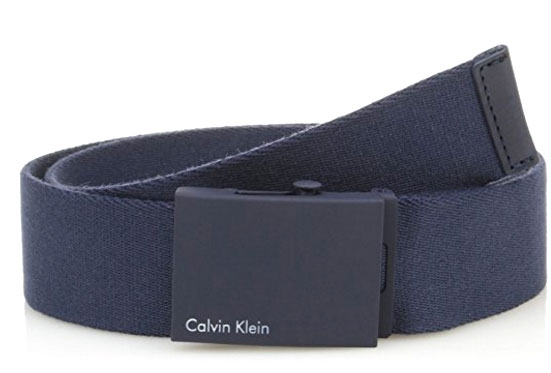 РеменьK50K500972_0000 РеменьK50K500972_0000Мужской ремень Calvin Klein выполнен из прочного качественного текстиля. Пряжка с названием бренда выполнена из металла, она позволит легко и быстро зафиксировать ремень и отрегулировать его длину. Уважаемые клиенты! Обращаем ваше внимание на тот факт, что размер ремня, доступный для заказа, является его длиной.