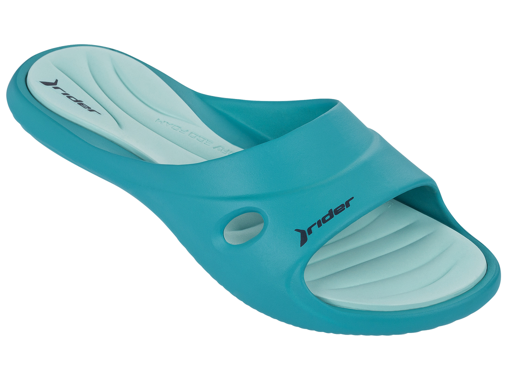 Шлепанцы81907-23404 Шлепанцы81907-23404Женские шлепанцы Slide Feet Vii Fem от Rider выполнены из ПВХ. Верх дополнен перфорацией. Стелька из материала ЭВА комфортна при движении. Основание подошвы дополнено рифлением.